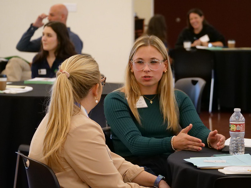 Harleigh Strack speaks to mentor Angel Jaramillo during the February 16 Mentoring Forum.