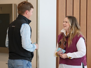 Abby Christian speaking to a male student